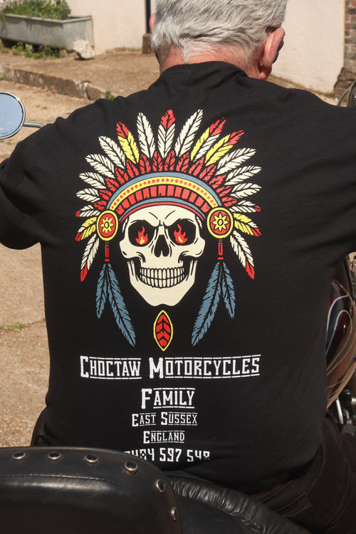 Person wearing a black shirt with a Choctaw Motorcycles design on the back.